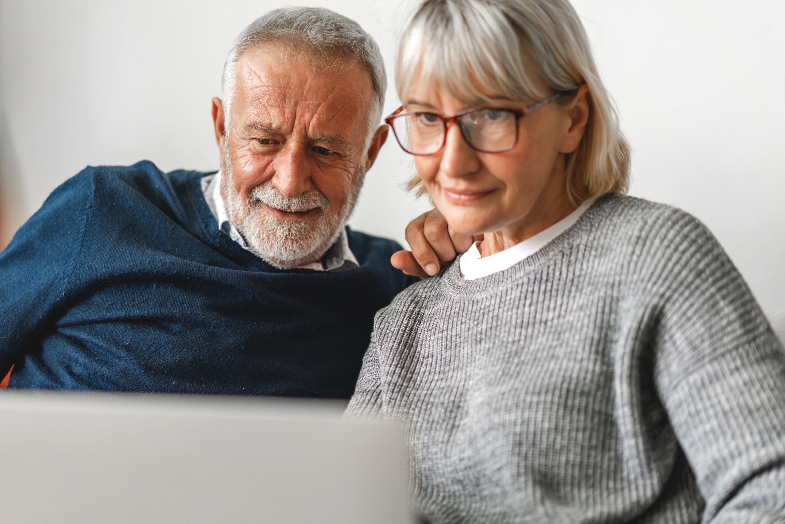 Long Term Disability Benefits being reviewed by older couple; Bryant Legal Group