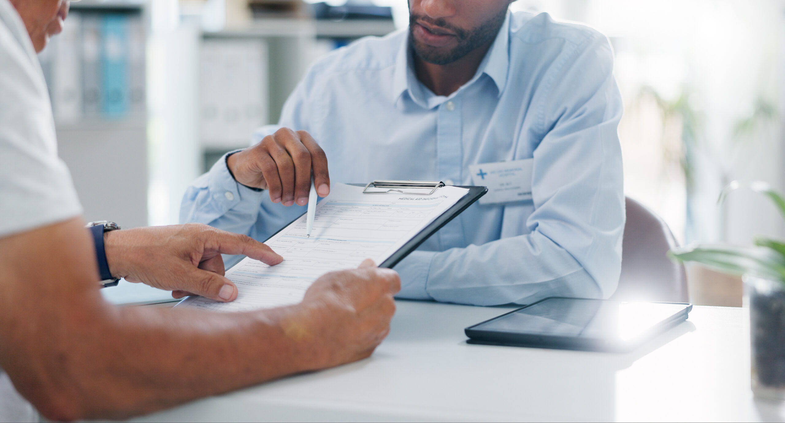 Payer Provider Dispute Man Discussing Bills Bryant Legal Group