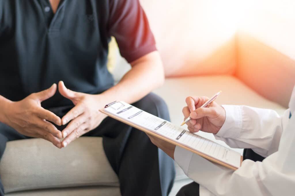  Doctor giving consult for problems to patient. 